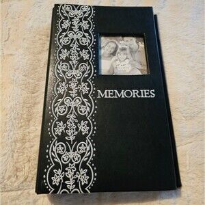 NEW Photo album. Black/White with Embroidery of Flowers & "Memories" 4x6 photos.